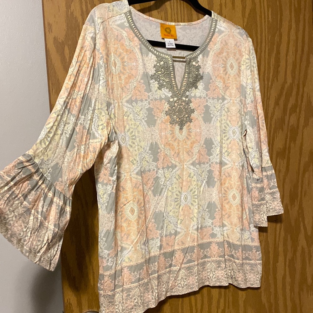 Boho print top with lace appliqué details and bell sleeves. NWOT. Never worn